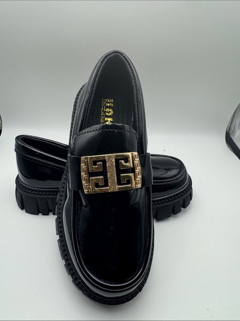Black Patent Leather Loafers with Gold Accent